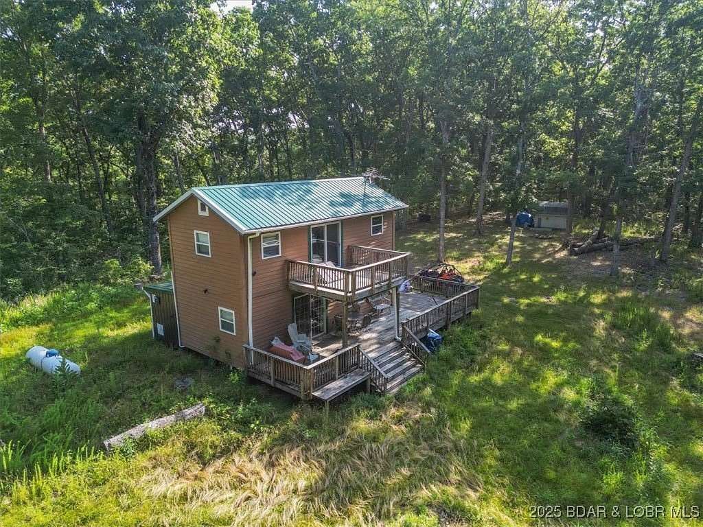 71 Acres of Recreational Land with Home for Sale in Lincoln, Missouri