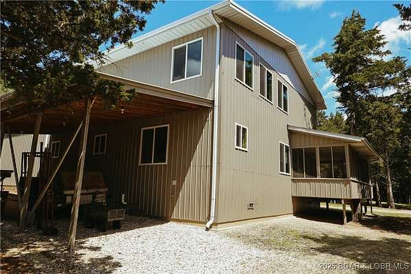 5.3 Acres of Residential Land with Home for Sale in Eldon, Missouri