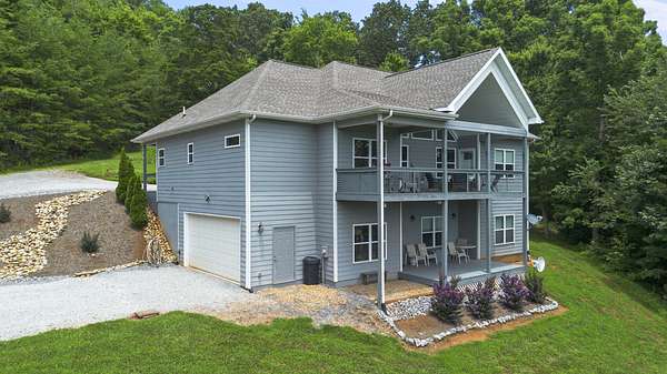 5.46 Acres of Residential Land with Home for Sale in Riceville, Tennessee