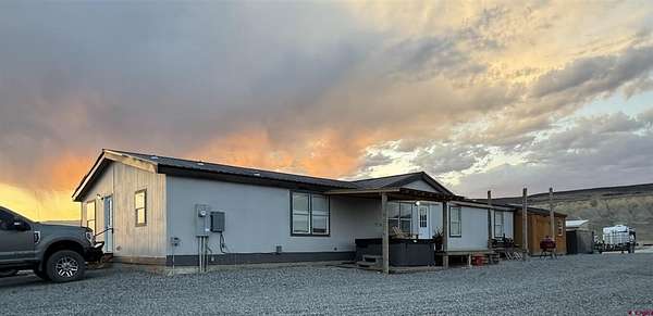 36.4 Acres of Land with Home for Sale in Hotchkiss, Colorado