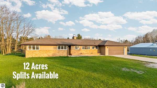 12 Acres of Land with Home for Sale in Bellaire, Michigan