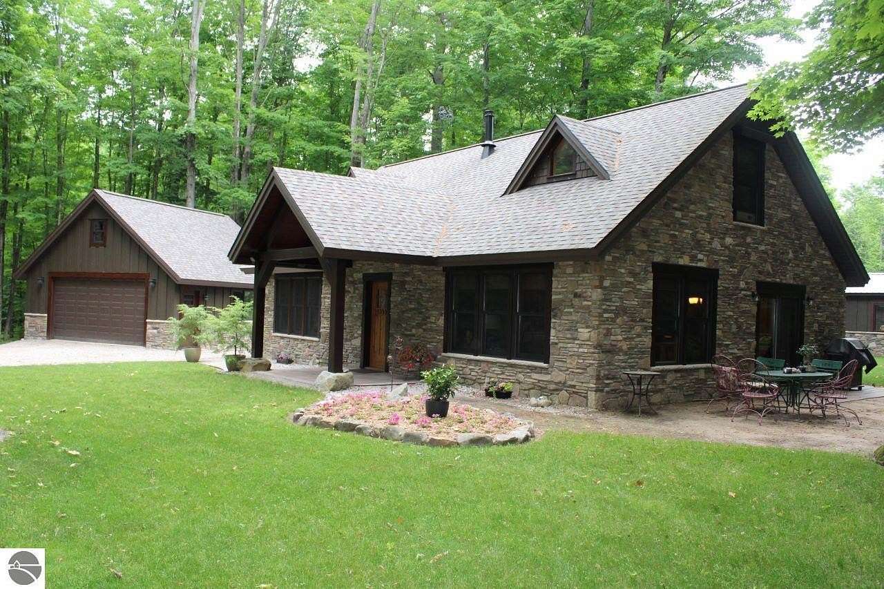 5.36 Acres of Residential Land with Home for Sale in Mancelona, Michigan