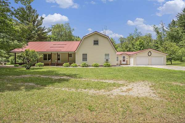 40 Acres of Recreational Land with Home for Sale in Glennie, Michigan