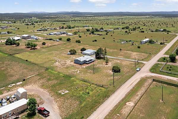 2.5 Acres of Residential Land with Home for Sale in Edgewood, New Mexico
