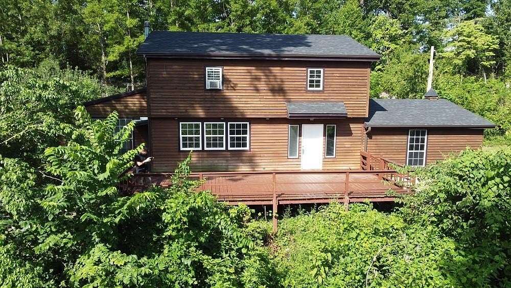 9.1 Acres of Residential Land with Home for Sale in Rogers, Arkansas