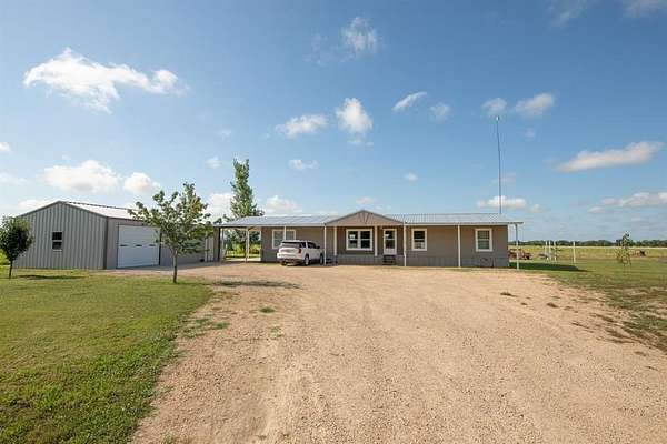 10 Acres of Residential Land with Home for Sale in Brookston, Texas