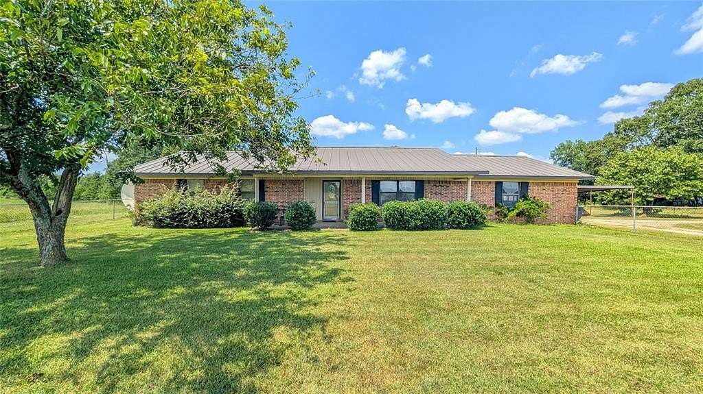 51.5 Acres of Agricultural Land with Home for Sale in Paris, Texas