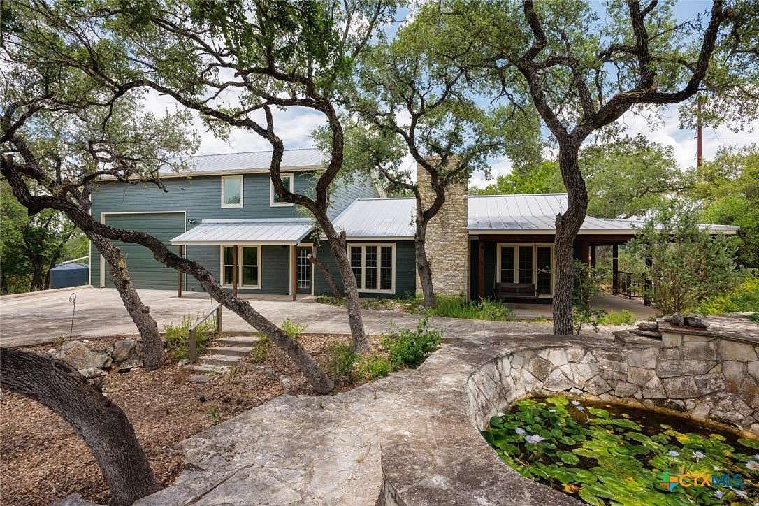 5.82 Acres of Residential Land with Home for Sale in Wimberley, Texas