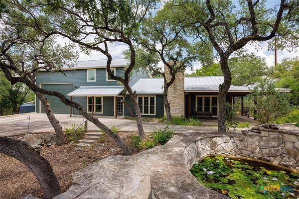 5.82 Acres of Residential Land with Home for Sale in Wimberley, Texas