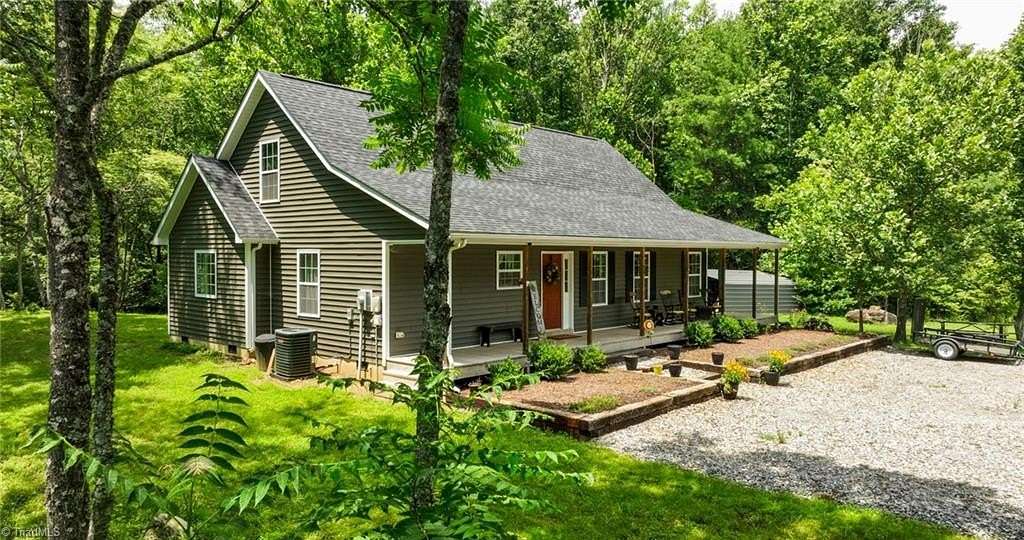 8.37 Acres of Land with Home for Sale in Purlear, North Carolina