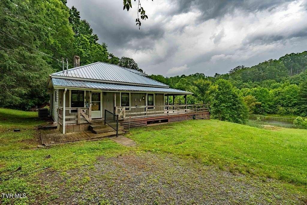 54 Acres of Land with Home for Sale in Roan Mountain, Tennessee