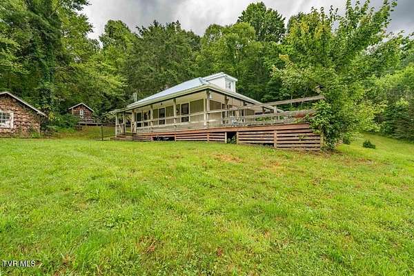 54 Acres of Land with Home for Sale in Roan Mountain, Tennessee