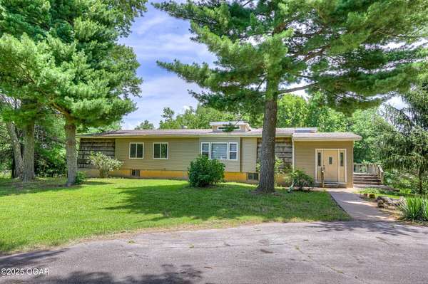 49 Acres of Recreational Land with Home for Sale in Joplin, Missouri