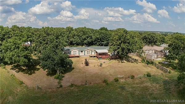 13.5 Acres of Land with Home for Sale in Warsaw, Missouri