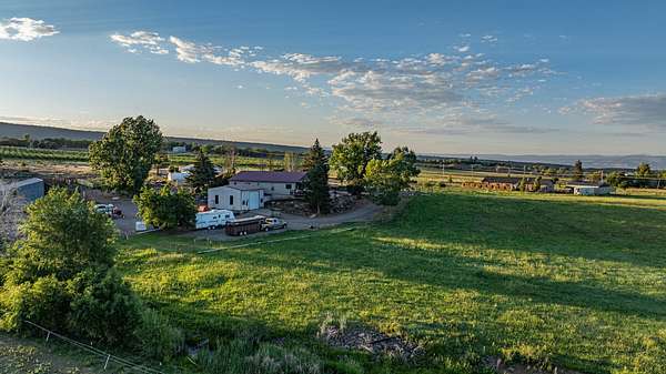 25.2 Acres of Agricultural Land with Home for Sale in Cedaredge, Colorado