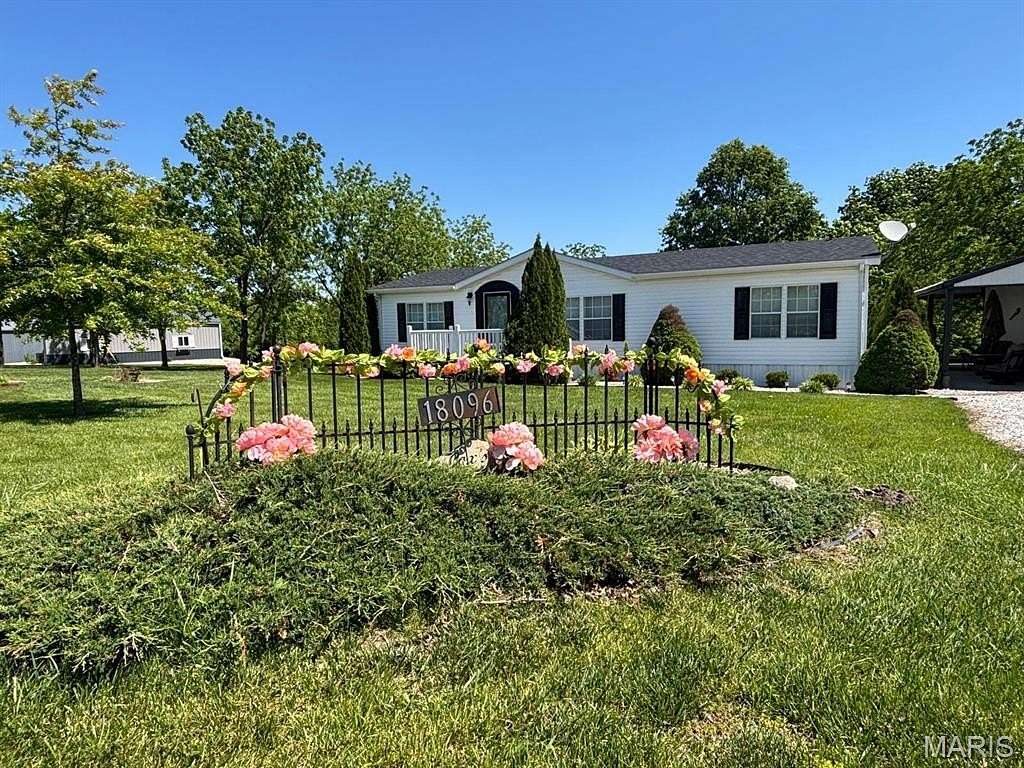 2.6 Acres of Land with Home for Sale in Paris, Missouri