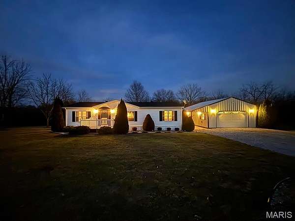 2.6 Acres of Residential Land with Home for Sale in Paris, Missouri