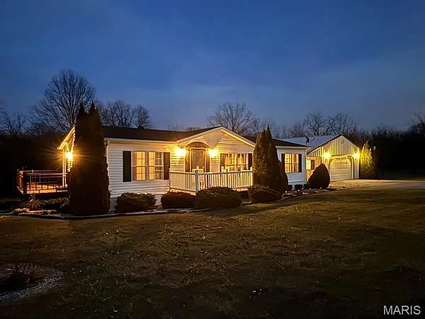 2.6 Acres of Residential Land with Home for Sale in Paris, Missouri