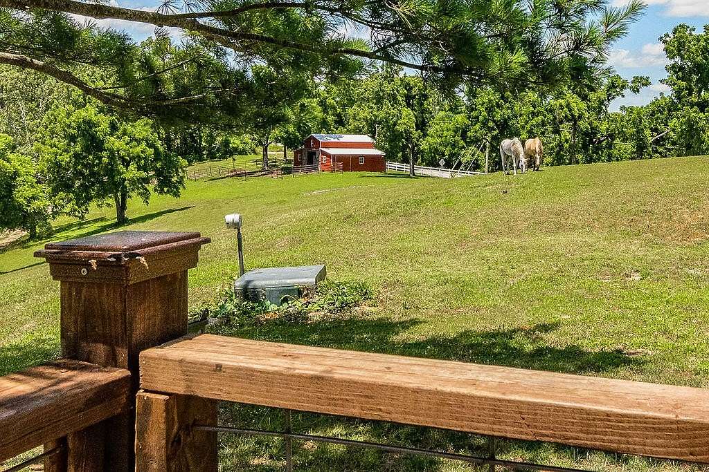 73.8 Acres of Recreational Land with Home for Sale in Cape Fair, Missouri