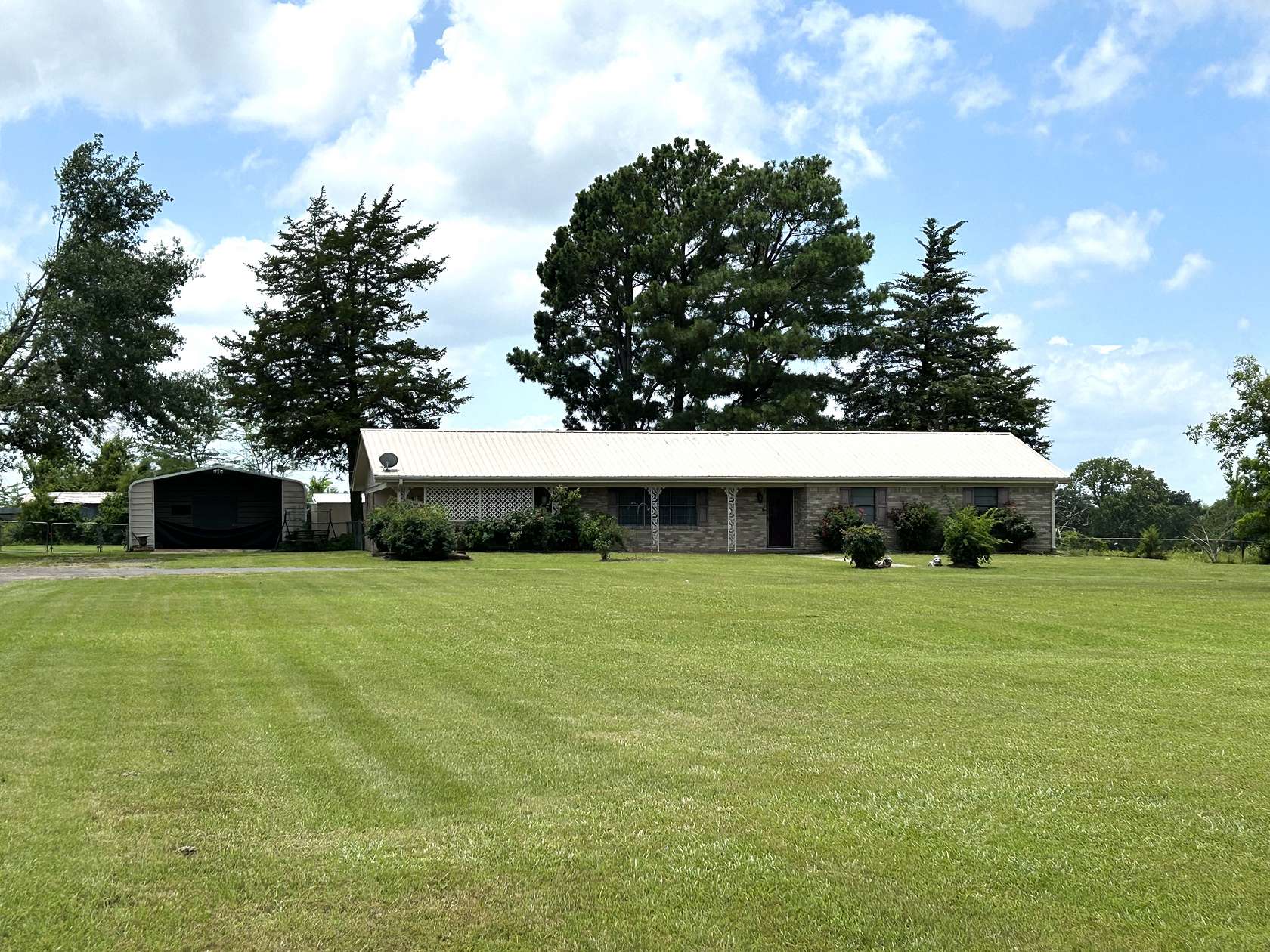 22.2 Acres of Agricultural Land with Home for Sale in Bogata, Texas