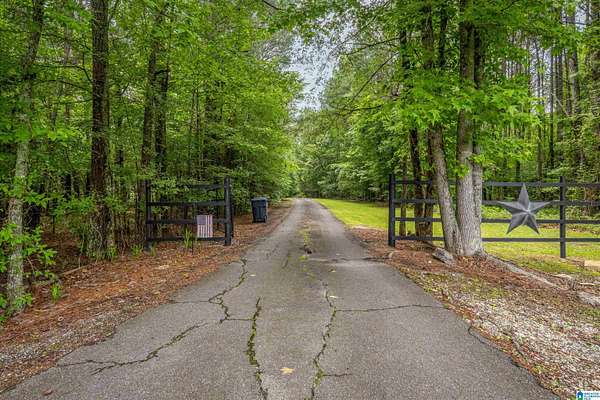 26.7 Acres of Land with Home for Sale in Jacksonville, Alabama