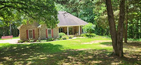 8.8 Acres of Residential Land with Home for Sale in Scottsville, Kentucky