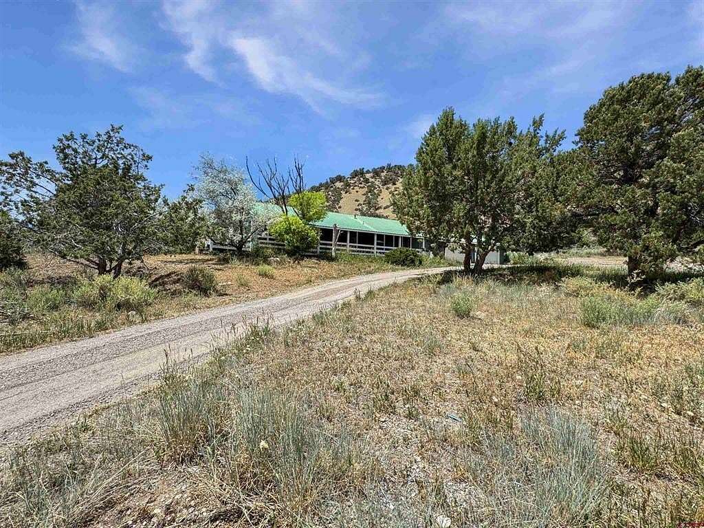 22 Acres of Land with Home for Sale in Crawford, Colorado