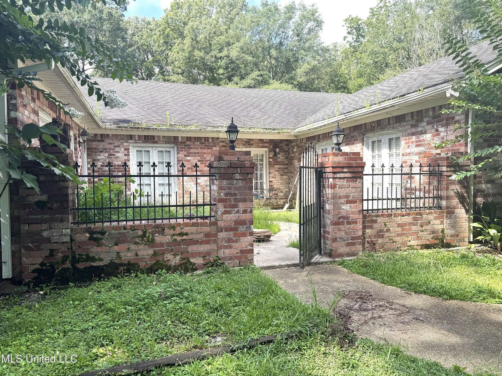 1.5 Acres of Residential Land with Home for Sale in Raymond, Mississippi