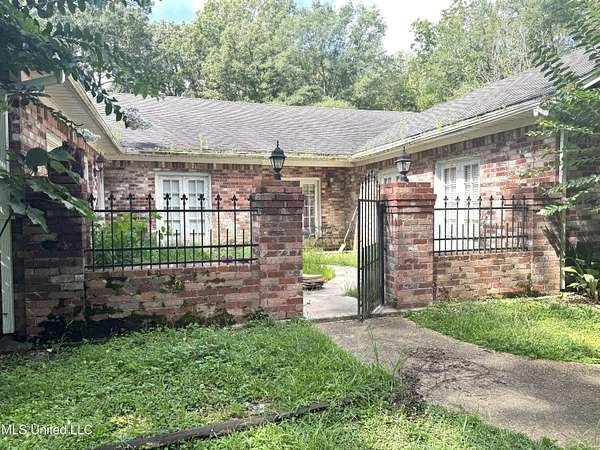 1.5 Acres of Residential Land with Home for Sale in Raymond, Mississippi