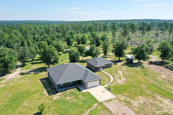 12.5 Acres of Land with Home for Sale in Baker, Florida