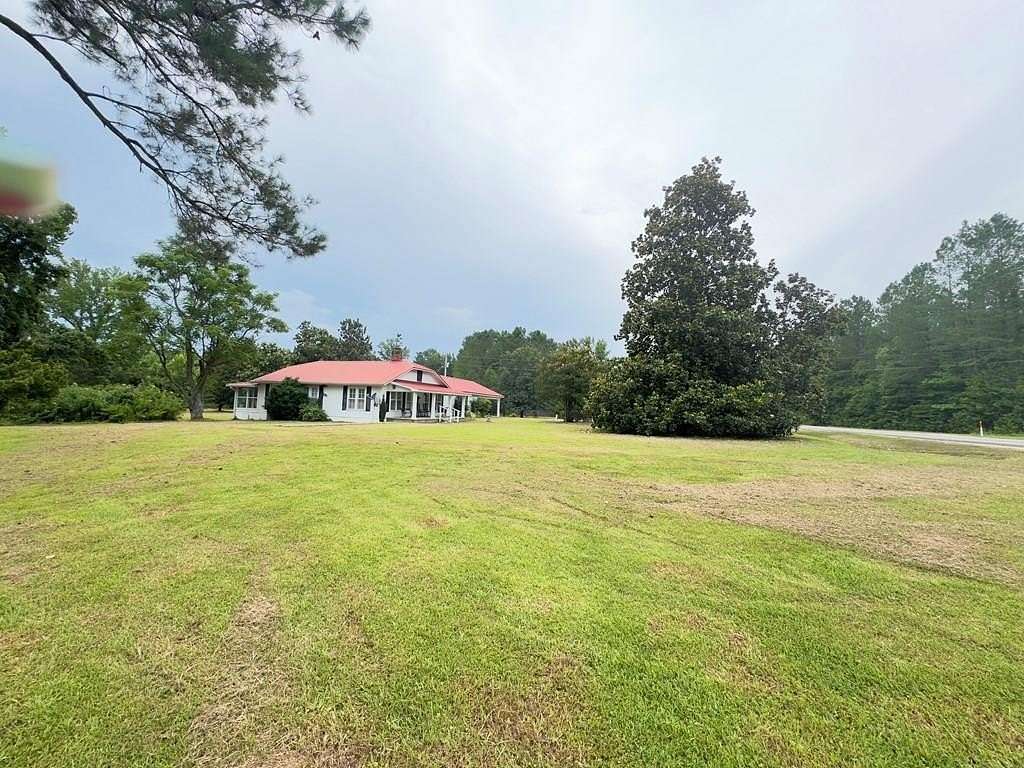 21.4 Acres of Land with Home for Sale in Bruce, Mississippi