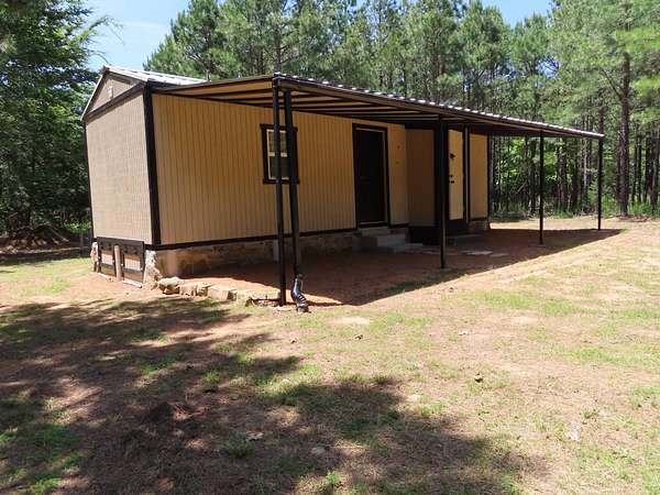 34.8 Acres of Recreational Land with Home for Sale in Panola, Oklahoma