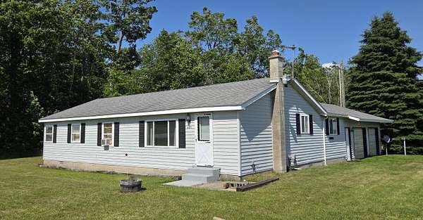 2.5 Acres of Residential Land with Home for Sale in Atlanta, Michigan