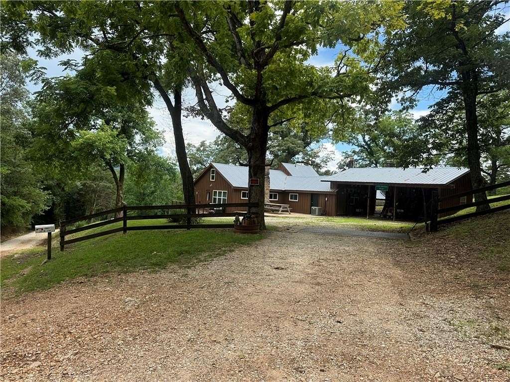 9 Acres of Residential Land with Home for Sale in Marble Falls Township, Arkansas