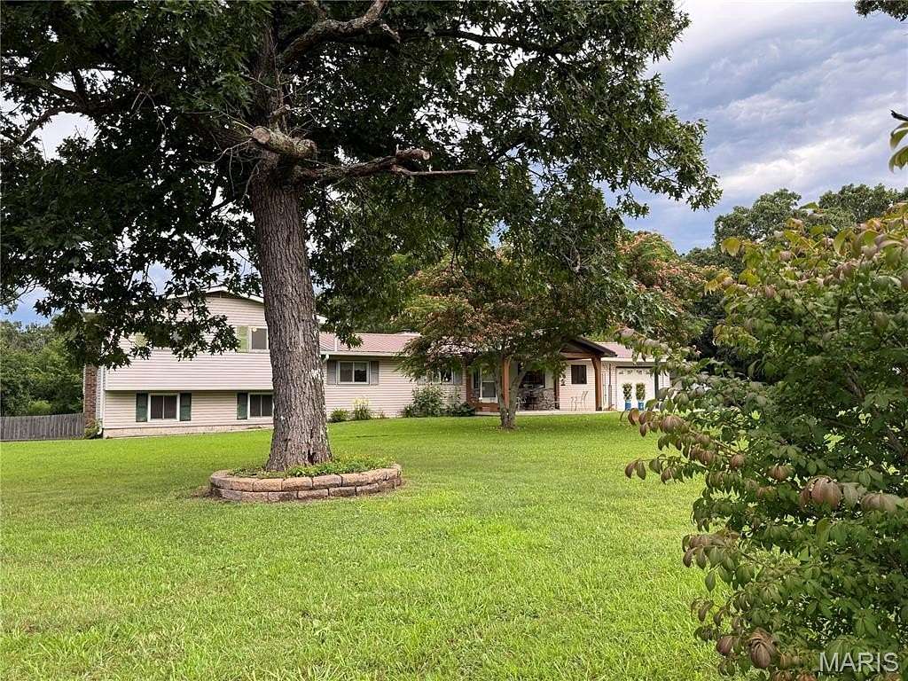 3 Acres of Residential Land with Home for Sale in Plato, Missouri