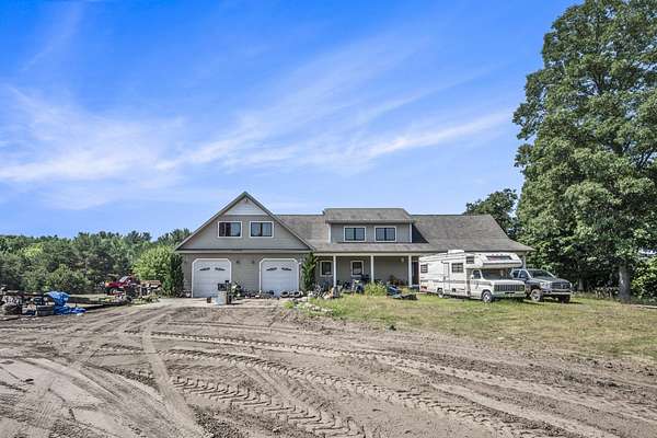 17.3 Acres of Land with Home for Sale in Ludington, Michigan