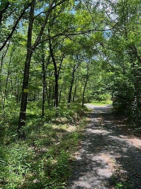 9.33 Acres of Residential Land with Home for Sale in Broken Bow, Oklahoma