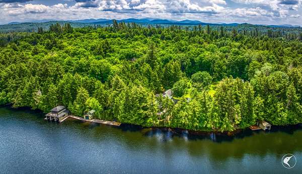 16.2 Acres of Land with Home for Sale in Paul Smiths, New York