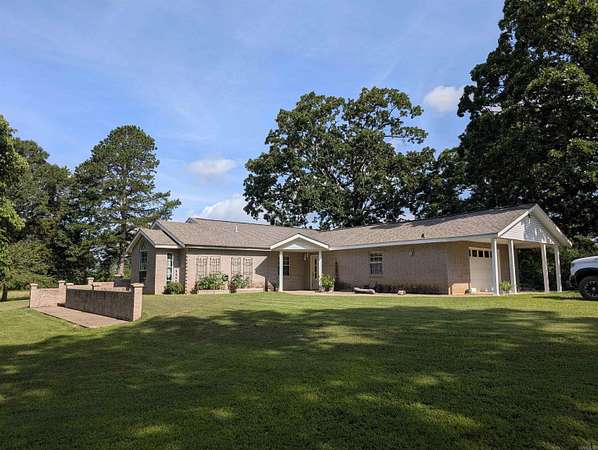 20 Acres of Land with Home for Sale in Cove, Arkansas