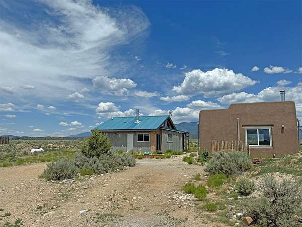 2.53 Acres of Land with Home for Sale in Arroyo Hondo, New Mexico