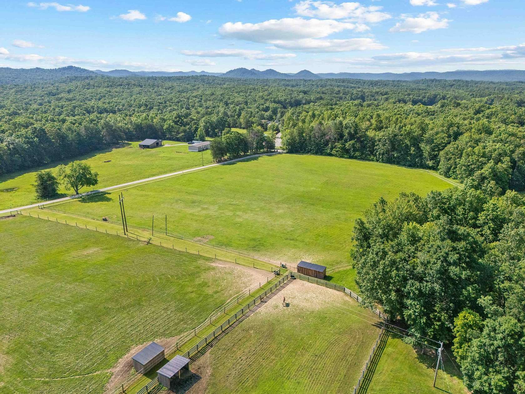 55.7 Acres of Land with Home for Sale in Jeffersonville, Kentucky