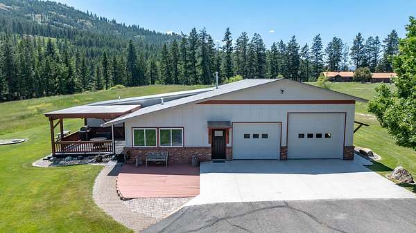 2.6 Acres of Residential Land with Home for Sale in Kalispell, Montana