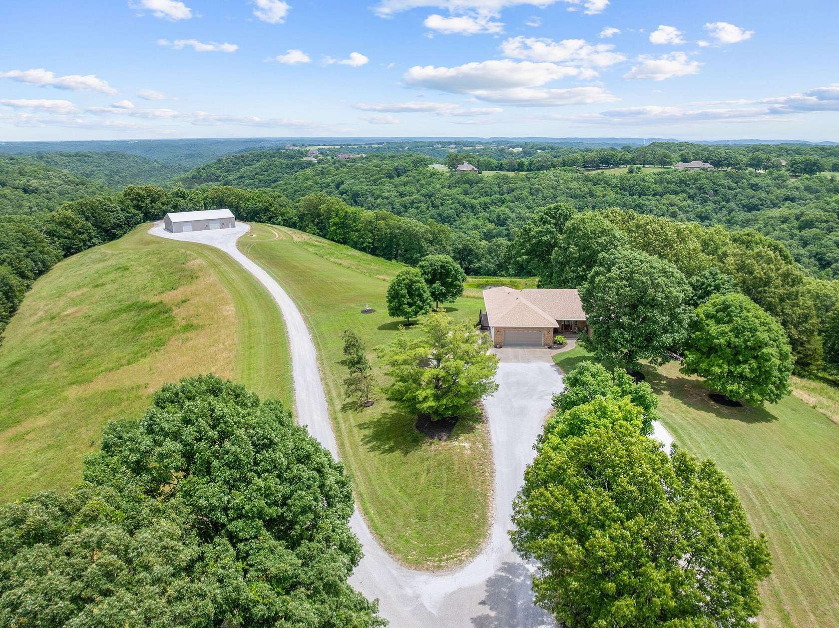 48.4 Acres of Recreational Land with Home for Sale in Reeds Spring, Missouri