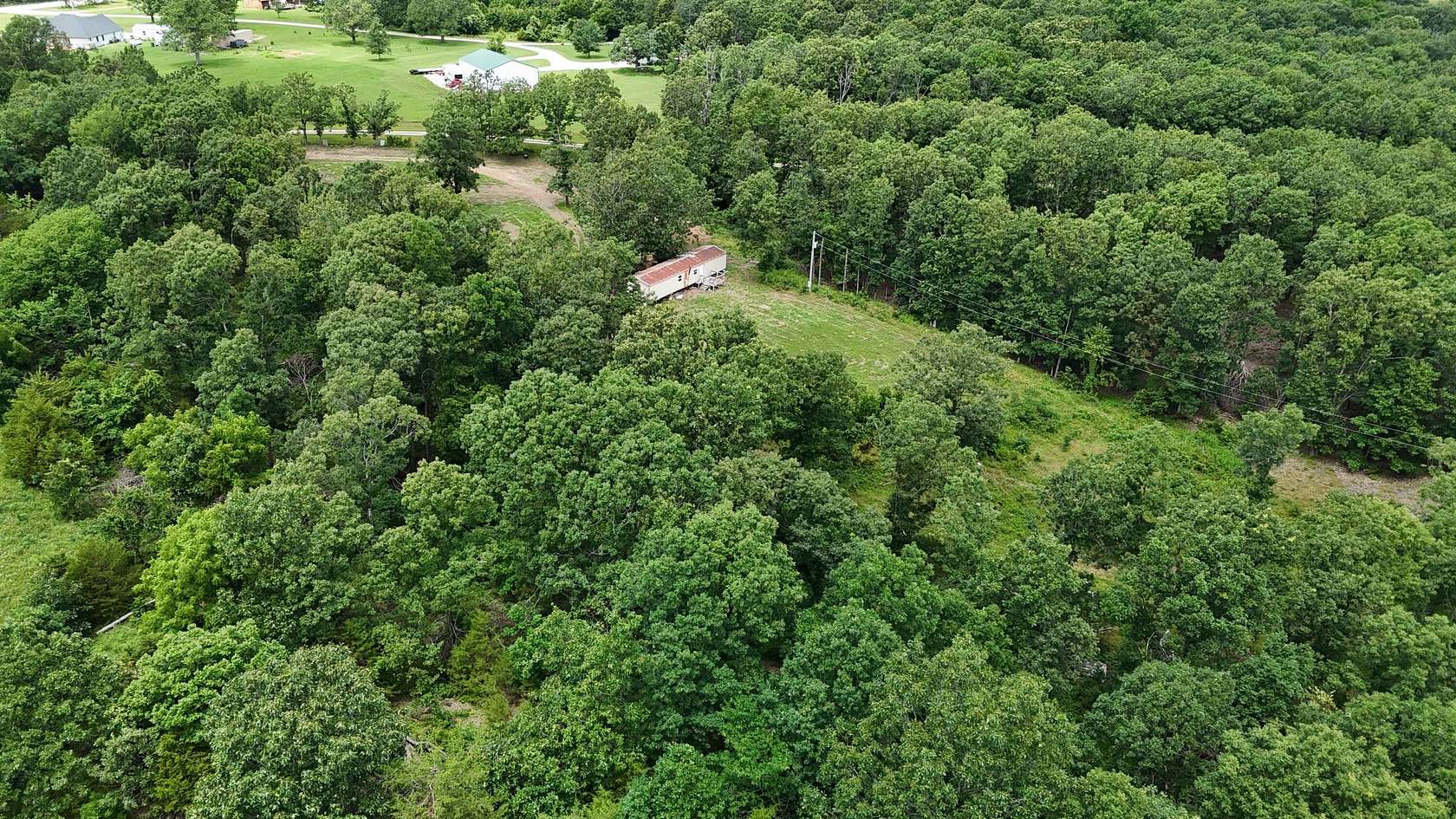 10 Acres of Residential Land with Home for Sale in Seymour, Missouri