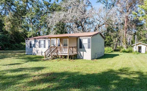5 Acres of Residential Land with Home for Sale in Lake City, Florida