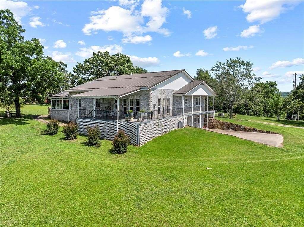 80 Acres of Land with Home for Sale in Berryville, Arkansas