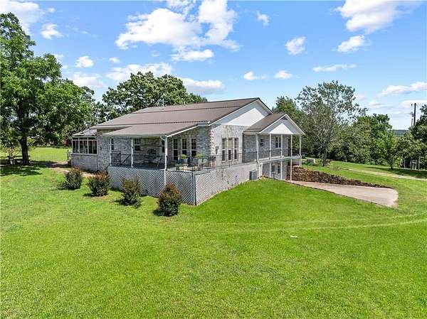 80 Acres of Land with Home for Sale in Berryville, Arkansas