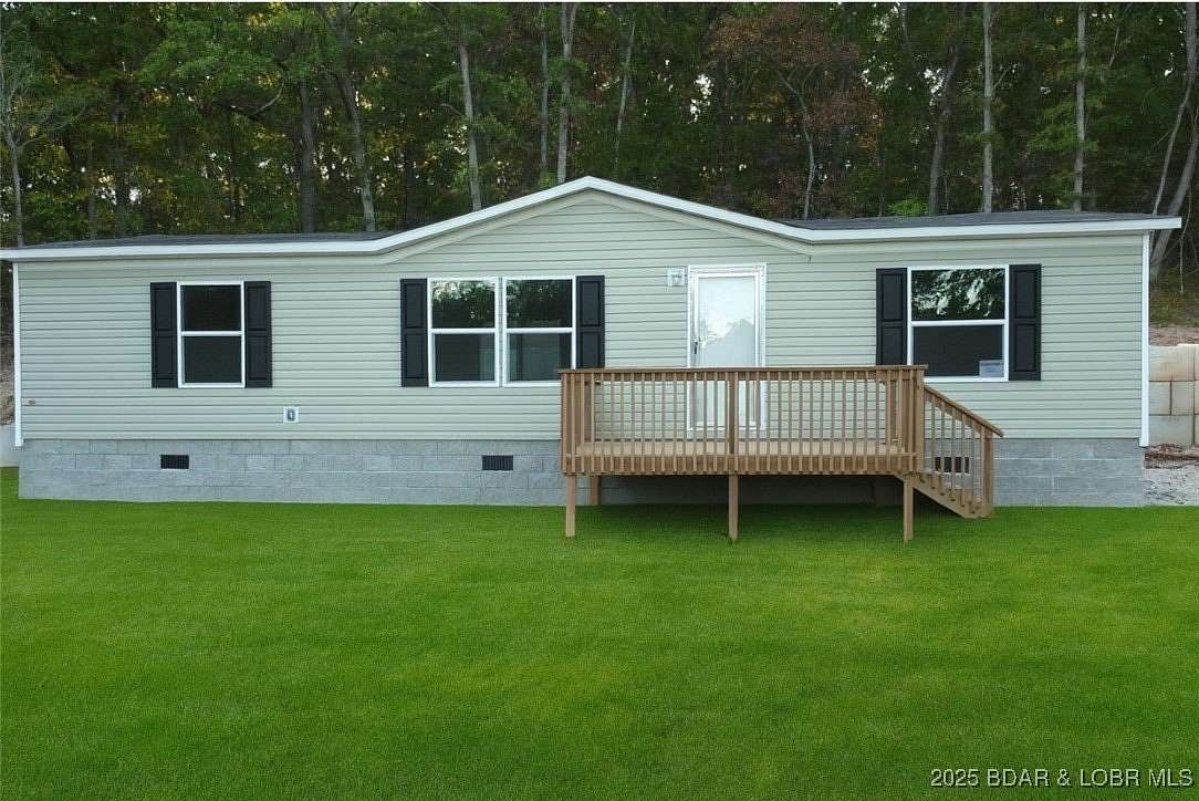 0.71 Acres of Residential Land with Home for Sale in Rocky Mount, Missouri