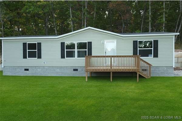 0.71 Acres of Residential Land with Home for Sale in Rocky Mount, Missouri