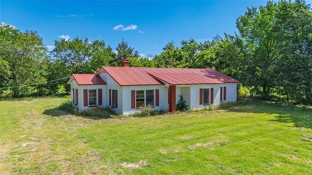 7 Acres of Residential Land with Home for Sale in Ladonia, Texas